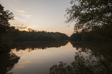 Fototapeta na wymiar An autumn twilight view of a cove in Lake Norman State Park in Troutman, North Carolina.