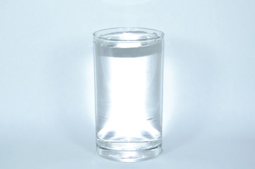 fresh water in drinking glass on white background 