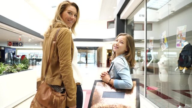Mother and daughter shopping day together