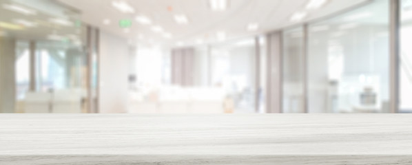 Marble stone tabletop and blurred bokeh office interior space background - can used for display or...
