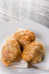 Served sarma in the plate above grey granite table background
