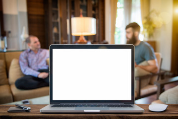 Computer Laptop and tablet computer  on the table blur background with bokeh, business technology concept