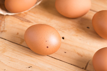 Organic eggs on wood. Fresh eggs.