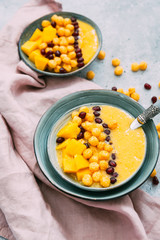Healthy breakfast. Mango smoothie with cereals