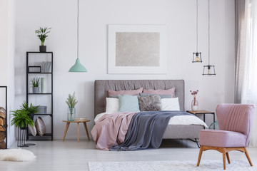 Pink chair in adorable bedroom