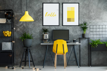 Work area with yellow lamp - obrazy, fototapety, plakaty