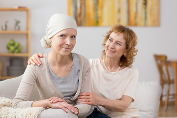 Cancer survivor sitting on couch