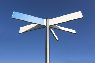 Blank sign post with blue sky background