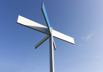 Blank sign post with blue sky background