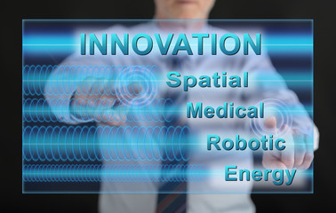 Man touching an innovation concept on a touch screen