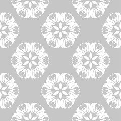 White floral seamless design on gray background