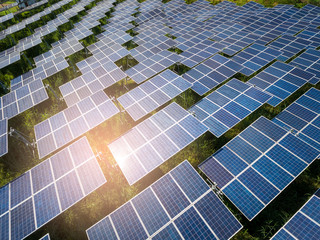 Beautiful sunset over Solar Farm with sunset on the background
