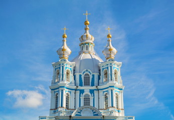Fototapeta na wymiar Domes of the Smolny Cathedral in the Baroque style. Architect Rastrelli