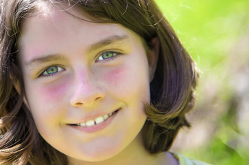 Close up portrait of a teenage girl smiling