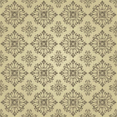 Seamless pattern. Golden textured curls. Oriental style arabesques. Brilliant lace, stylized flowers. Openwork weaving delicate, golden background. Damascus motif.