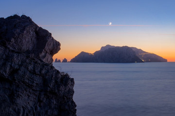 Capri Island snatched by the Cliff's Mouth, Amalfi Coast, Bay Of Naples, Naples, Campania, Italy.