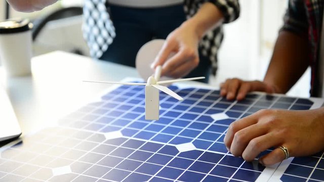 female engineer hold a windmill sample