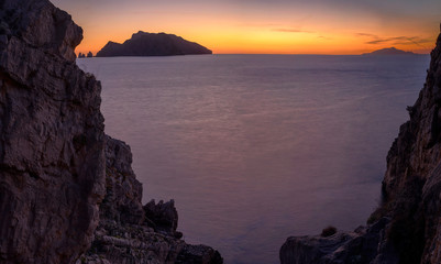 Capri Island under the Evening Blue Hours, from Punta Campanella, Amalfi Coast, Bay Of Naples, Naples, Campania, Italy.