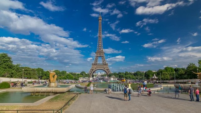 Fountains on famous square Trocadero with Eiffel tower in the background timelapse hyperlapse.