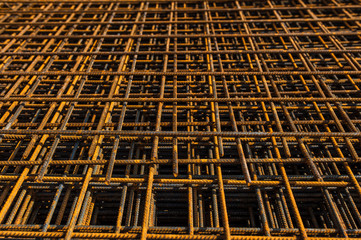 Stacked reinforced steel foundation bars on construction site 