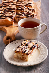 Apple and pear sponge cake with chocolate drizzle