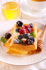 Waffles with sour cream, berries