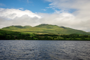 Cloudy summer highlands landscape at Loch Tay scenic coastline, central Scotland