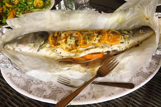 whole sea bass stuffed with orange, lavender and fennel served with zucchini courgette, broad bean, pea and mint salad
