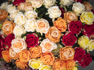 A bouquet of tea roses. Pink, red, white, blue, yellow