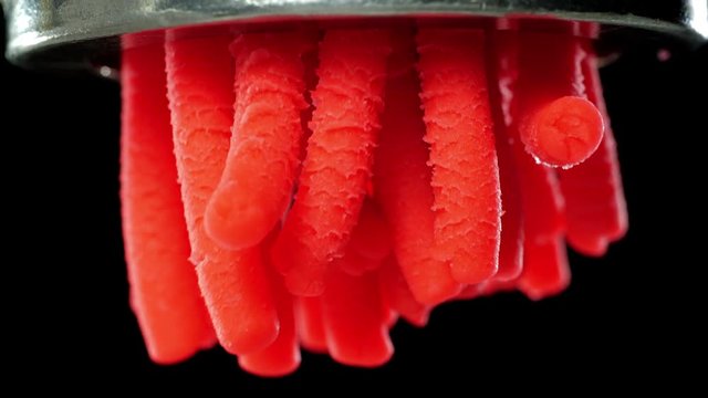 Meat grinder grinds the abstract meat.
