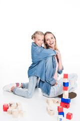 mother and daughter with aphabet blocks