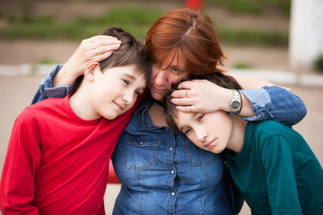 Fototapeta premium mother with sons twins