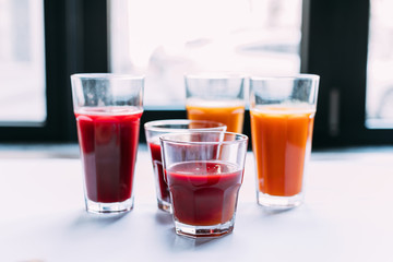 various smoothies in glasses