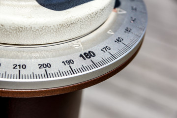 close up at numbers on compass and set of rulers