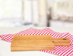 Board accessory with  checkered tablecloth 