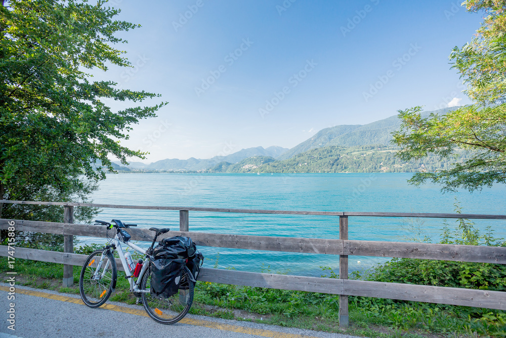 Wall mural cycle touring in italy, via claudia augusta at caldonazzo lake