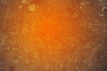 Obraz premium the background of dirty cement and orange light