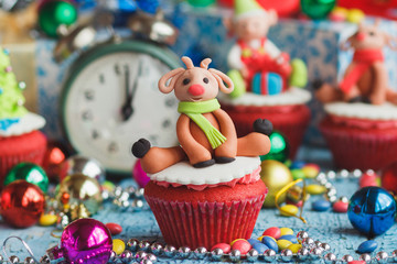 Christmas cupcakes with colored decorations