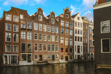 Fototapeta na wymiar Amsterdam buildings on the water, Netherlands