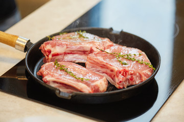 Roasted fresh pork meat steak in a frying grill pan