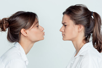 Studio portrait of female twins
