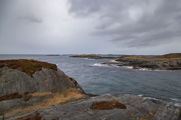 Fototapeta na wymiar Coast of Eldhusoya Island, Norway 