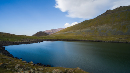 Naklejka na ściany i meble Alpine Lake in Kyrgyzstan