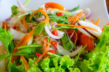 Squid and shrimp salad with spicy taste. Thai food salad background