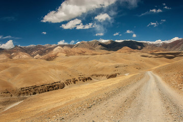 Gravel road at Langqen Zangbo or upper Sutlej valley, Ngari Prefecture, Zanda County, Tibetan Autonomous Region, China.