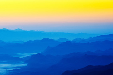 Beautiful silhouette mountains sunrise at Doi Inthanon National Park. Chiang Mai, Thailand.