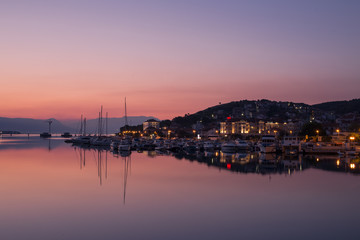 Fototapeta premium Waterfront view of beautiful Trogir, Croatia - Unesco World Heritage Site. Image take before sunrise, at the blue hour.