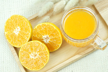 Fresh orange juice with orange fruits isolated on white background , top view