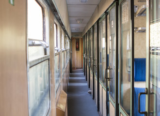 Inside an empty passenger car high-speed train in the evening