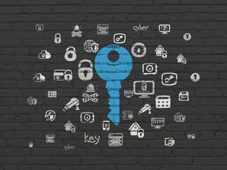 Security concept: Key on wall background